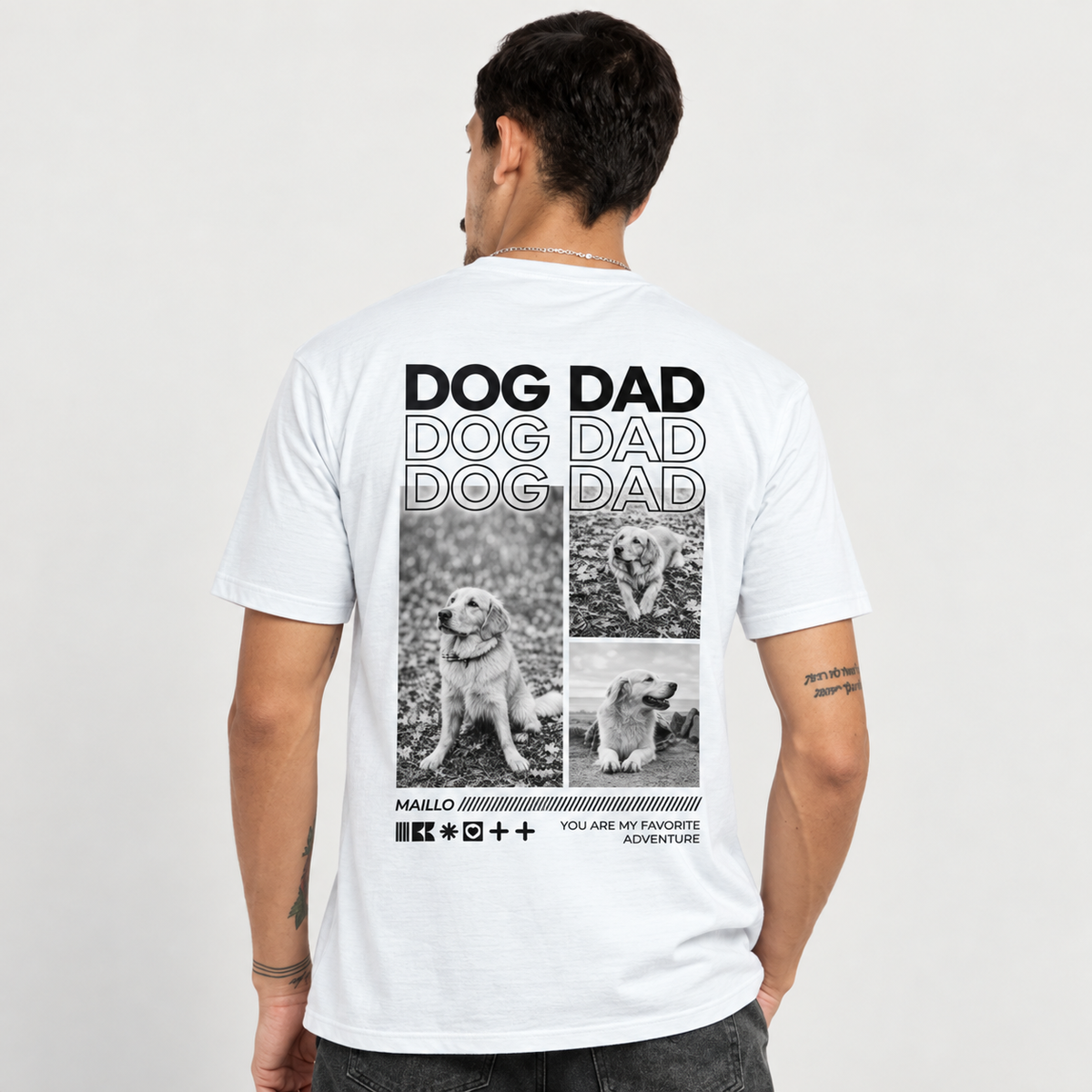 Camiseta blanca con el texto "DOG DAD" y tres fotos de perros en la espalda.