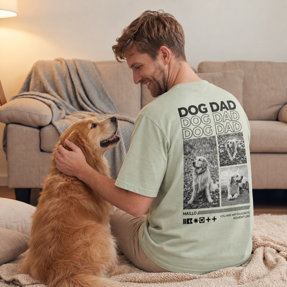 Camiseta verde claro con el texto "Dog Dad" y motivos de perros, llevada por un hombre sentado en el suelo.