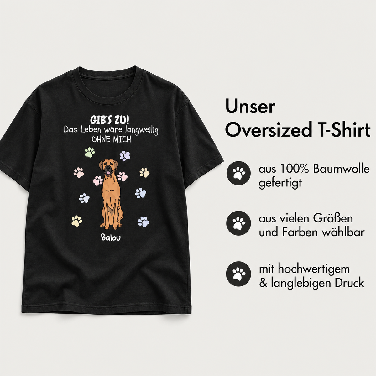 Camiseta oversize negra 100% algodón con diseño de perro y huellas de colores.