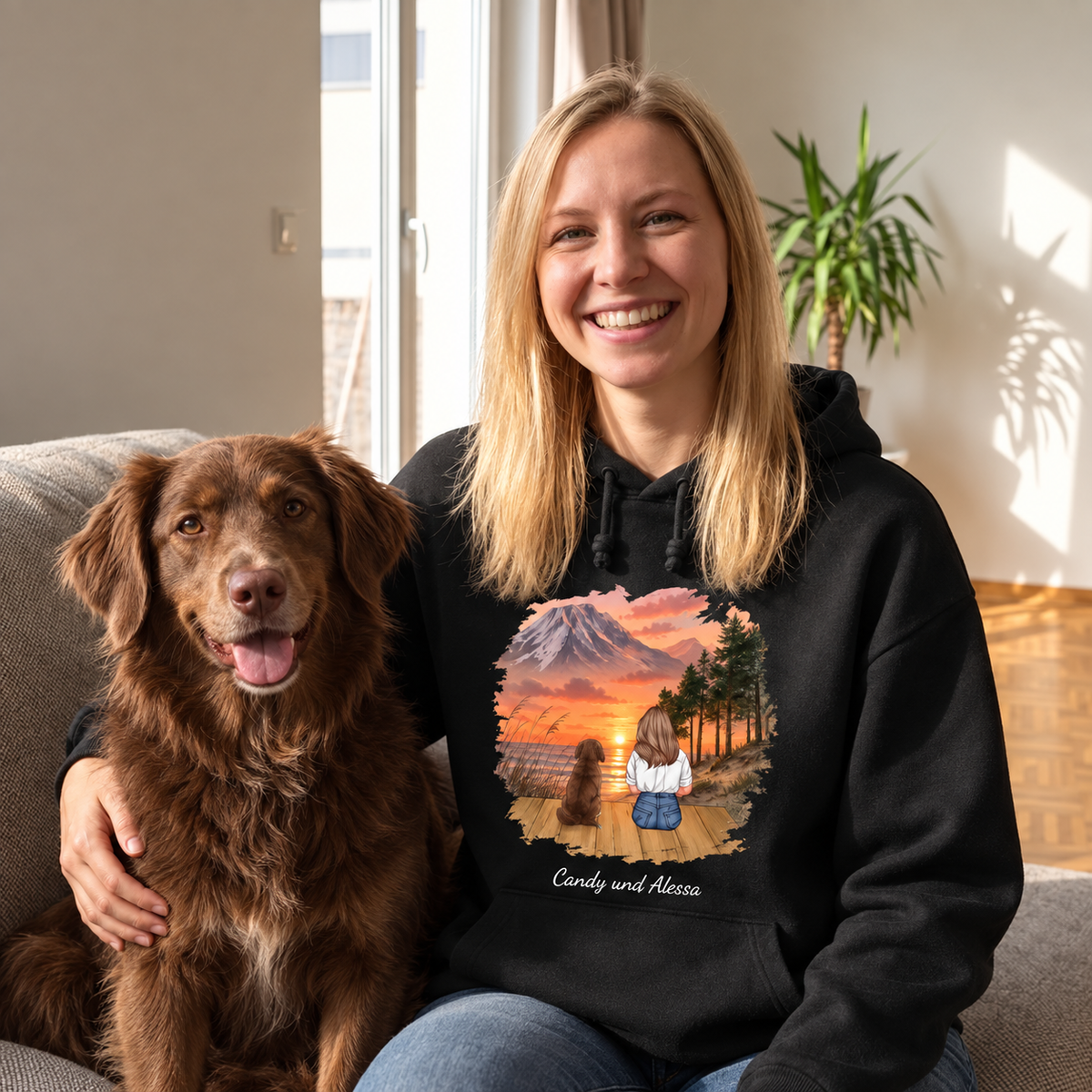 Sudadera con capucha negra personalizada con motivo de una mujer y un perro ante un paisaje de montaña.