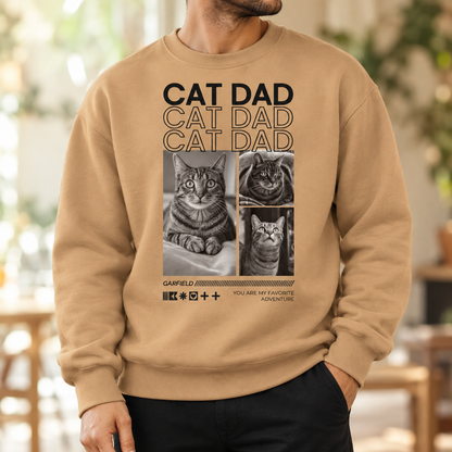 Sudadera beige con el texto "Cat Dad" y fotos de gatos, corte holgado, algodón.