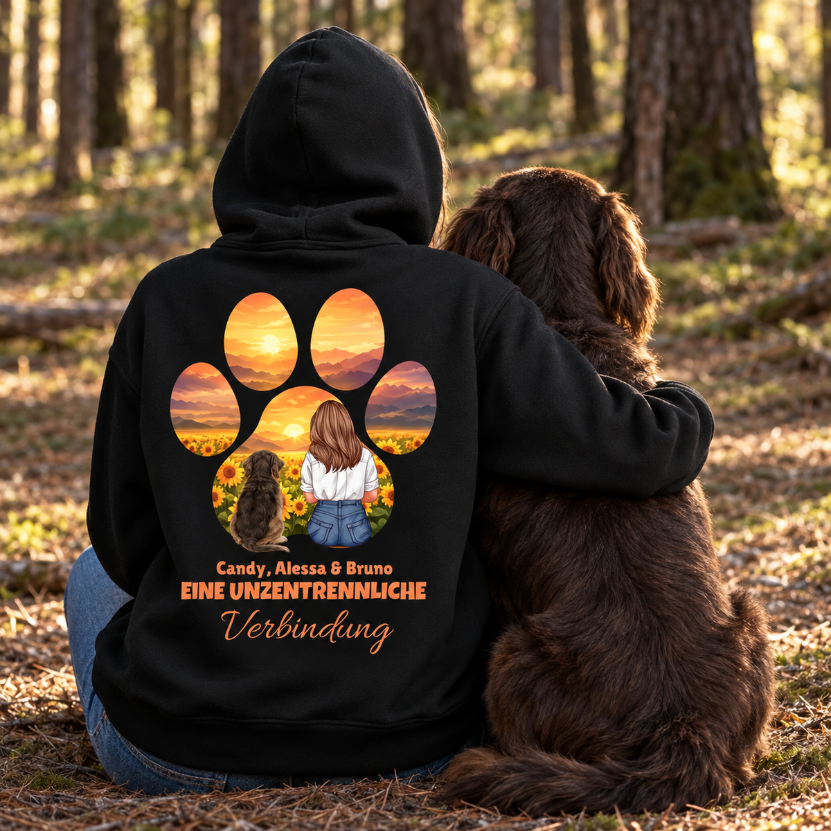 Sudadera con capucha negra con una niña y un perro entre girasoles y el texto "Eine unzertrennliche Verbindung".